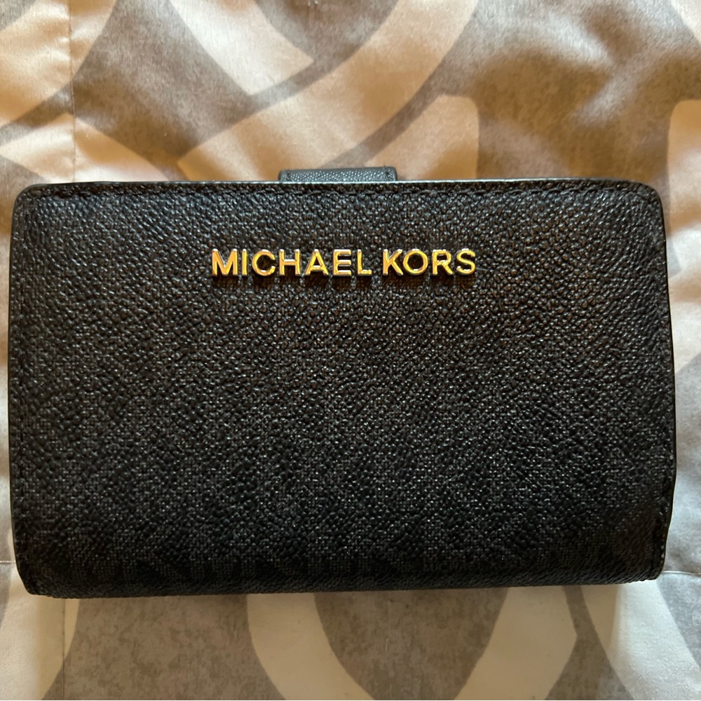 Michael Kors wallets/wristlet